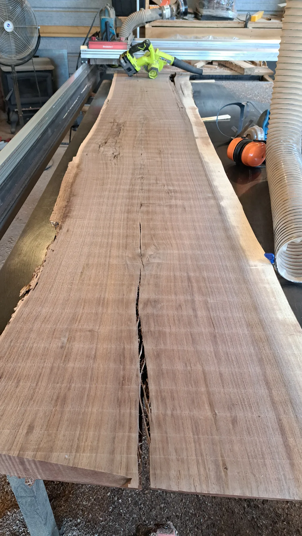 family walnut table from their tree behind the build photo 1