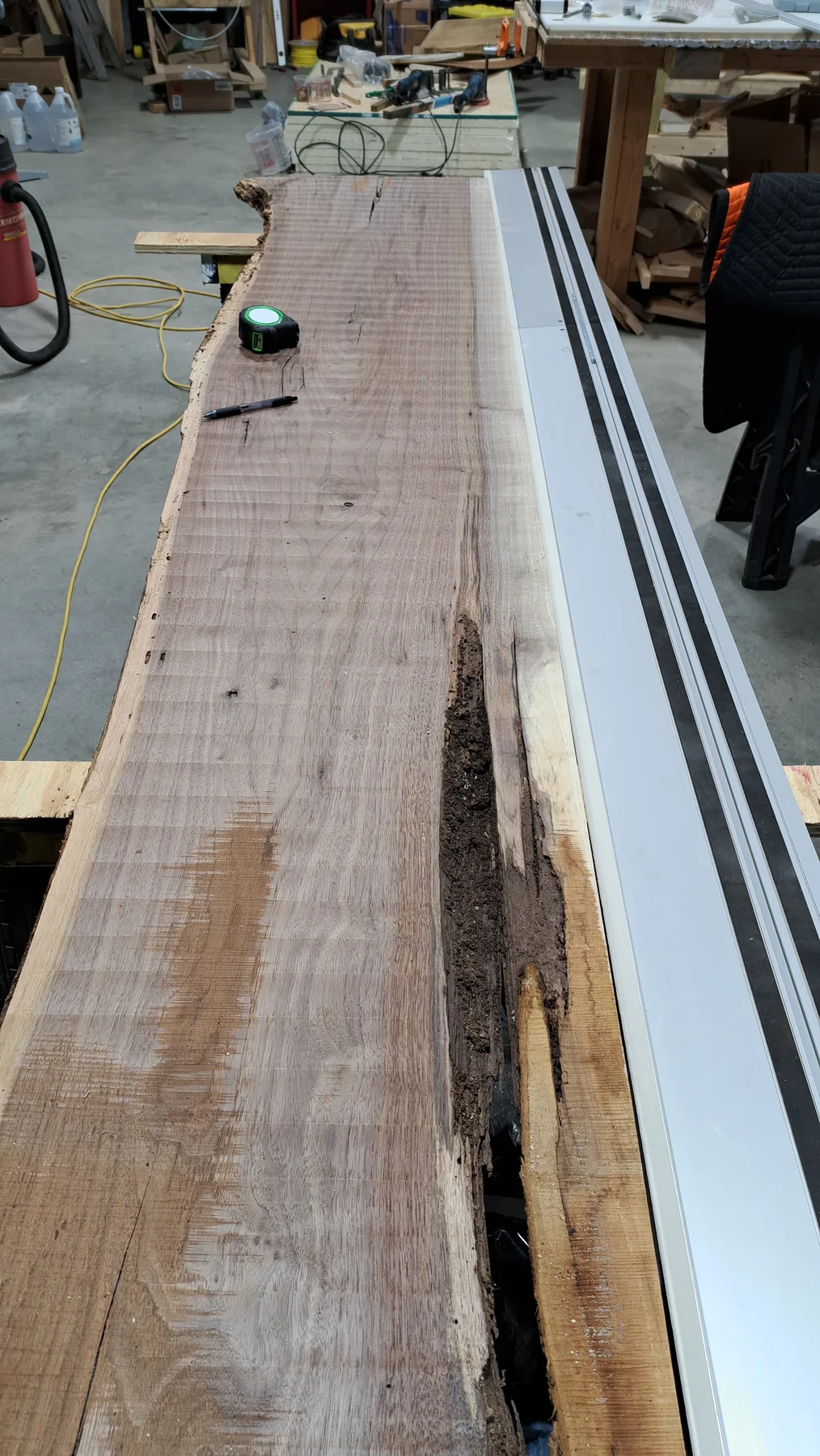 family walnut table from their tree behind the build photo 3