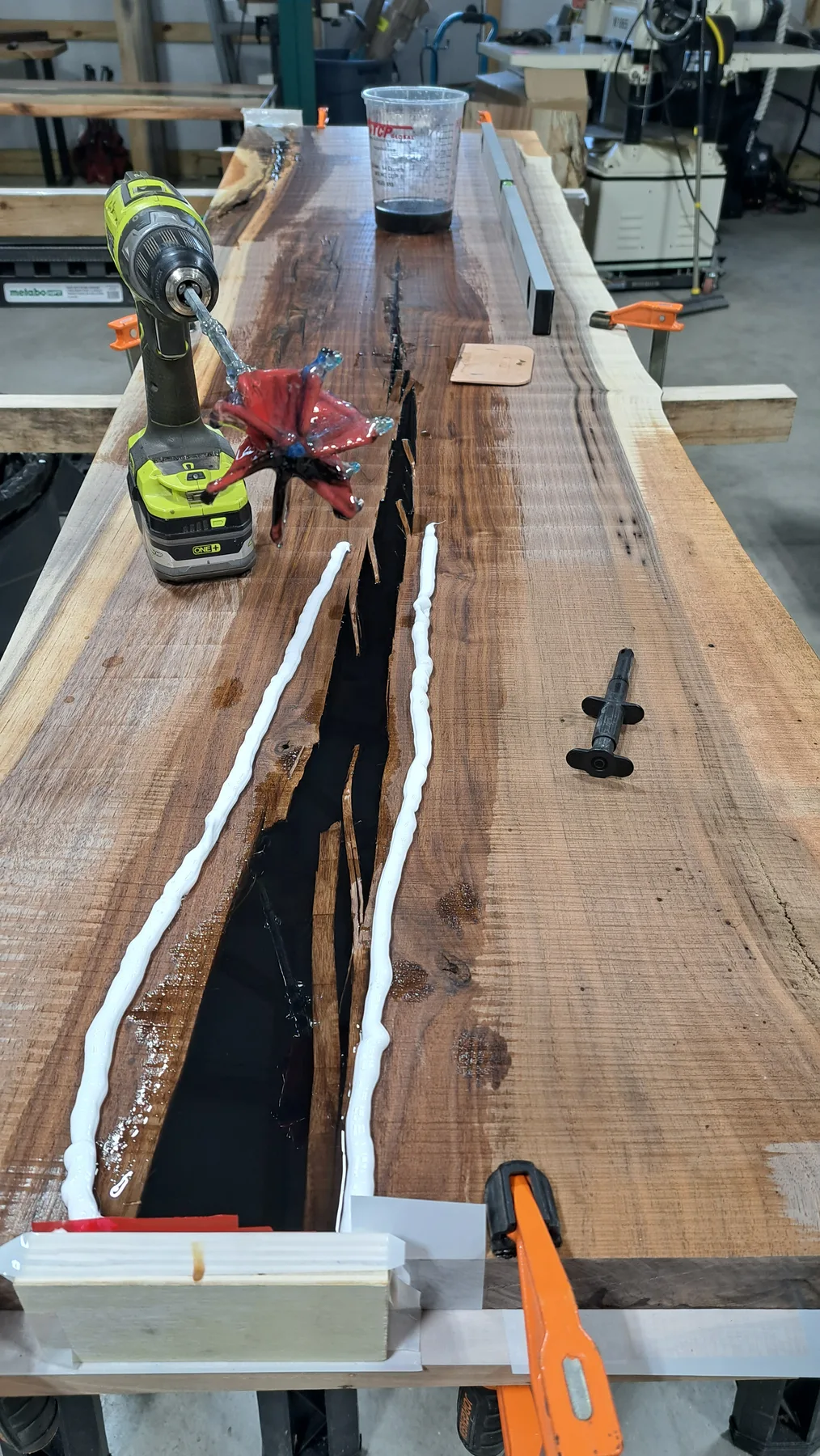 family walnut table from their tree behind the build photo 5