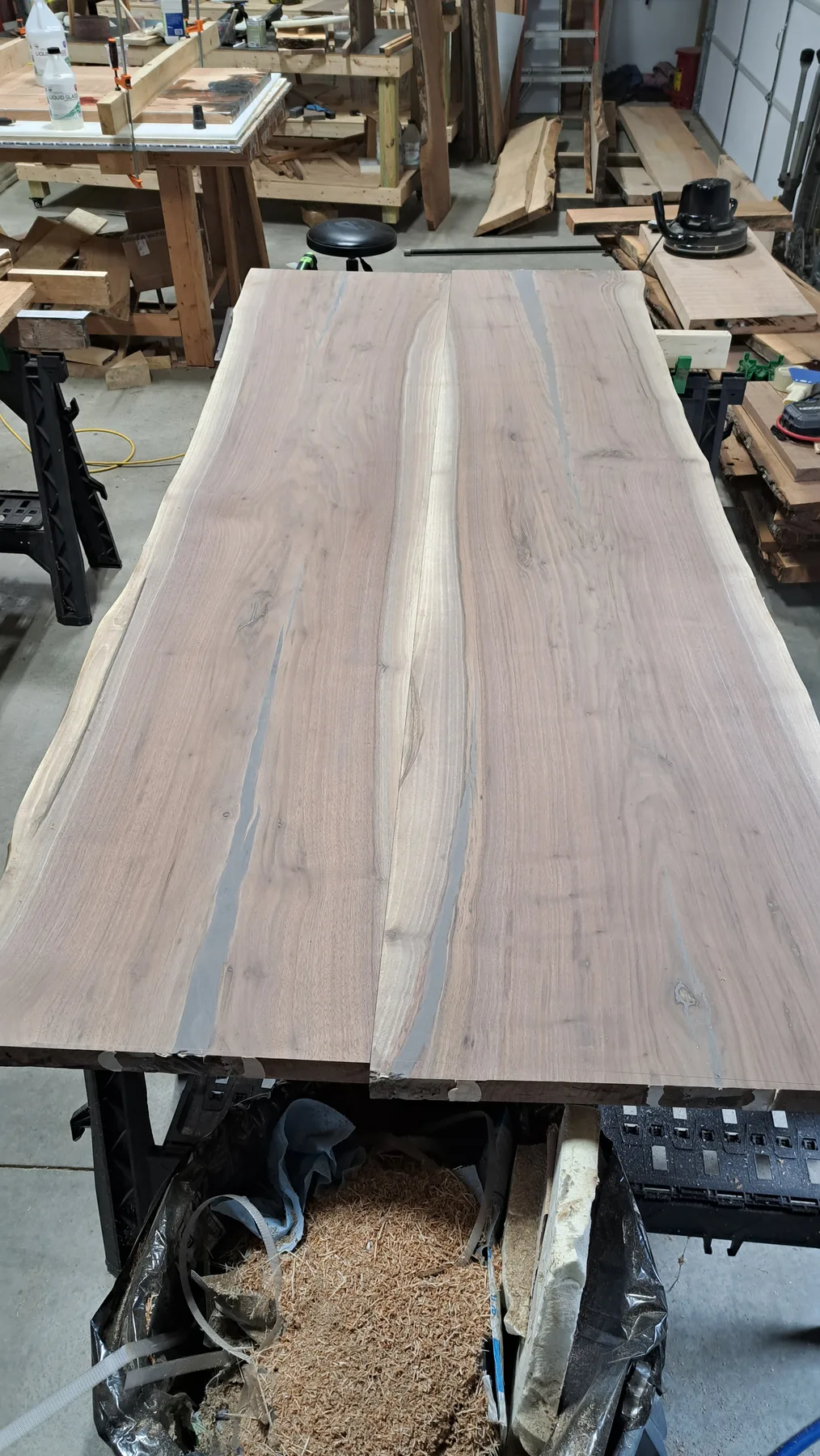 family walnut table from their tree behind the build photo 7