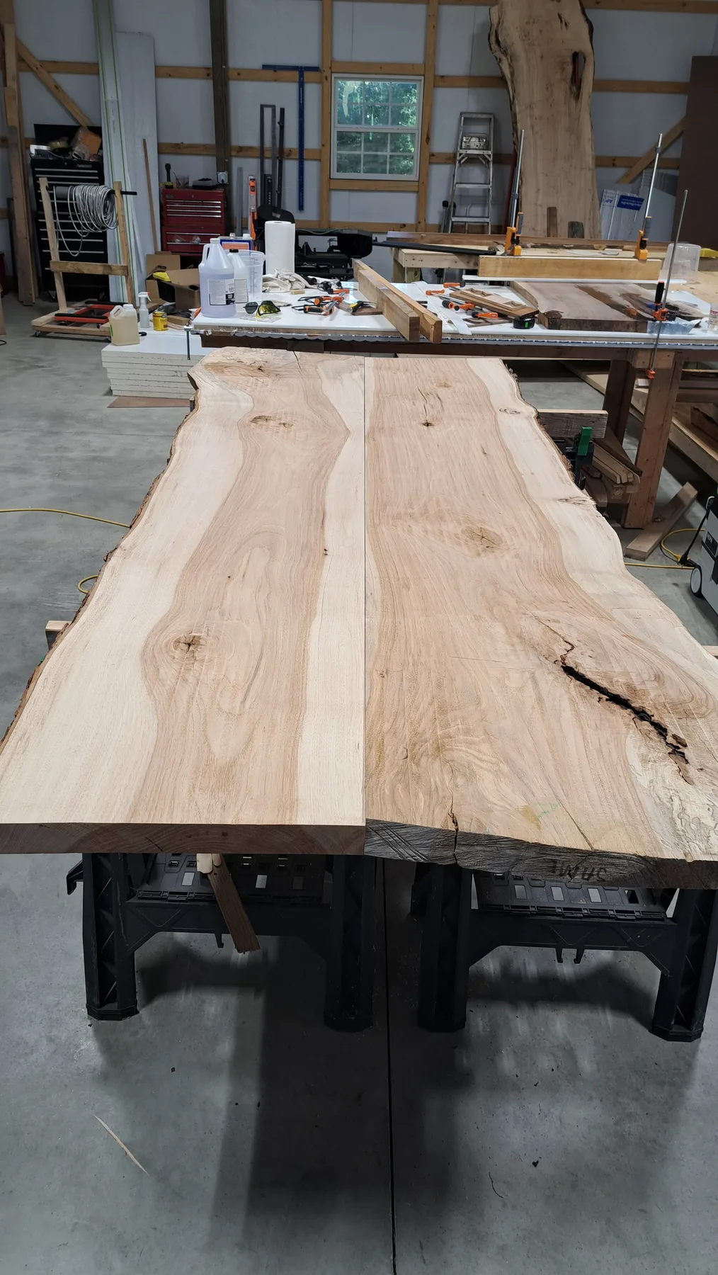 historic pecan dining table behind the build photo 2